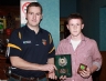 Paddy Richmond presents Enda Mc Ferran with the Under 14 Ulster Hurling Féile 